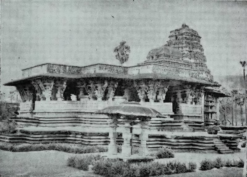 A temple on a high stepped platform, with a pillared hall in front, a tower over the shrine at the right and a small pavilion in the foreground.