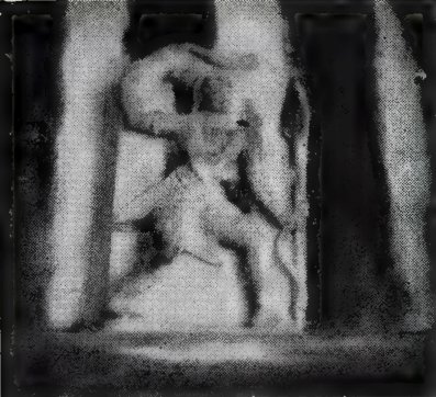 A blurred relief of a man in an energetic pose bending a long sword, carved between two pillars.